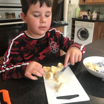 Jamie chopping fruit